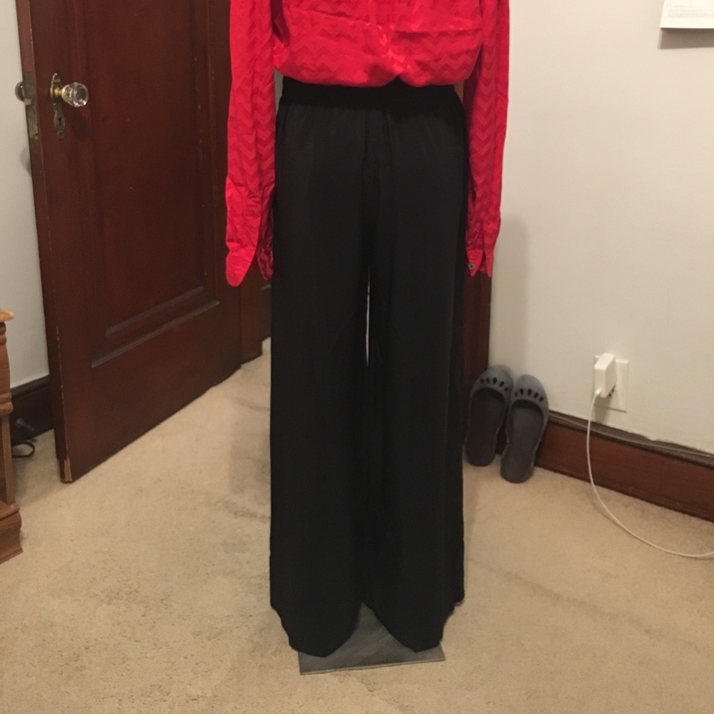 New without tags Amanda Uprichard black small size pure silk pants.